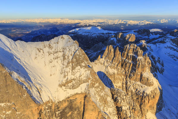Aerial view of Catinaccio Group and Vajolet Towers at sunset. Sciliar Natural Park Dolomites Trentino Alto Adige Italy Europe