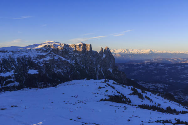 Aerial view of Siusi Alp at sunset. Gardena Valley Sciliar Natural Park Dolomites Trentino Alto Adige Italy Europe