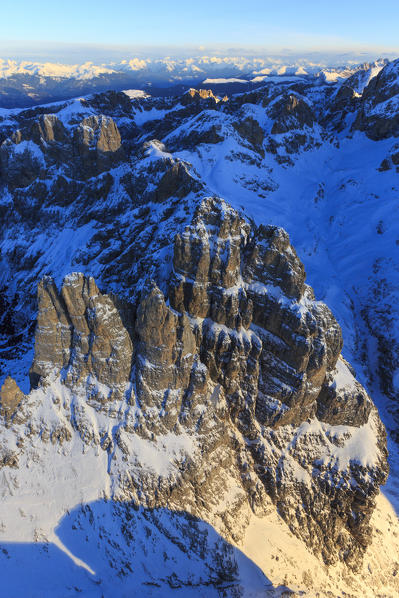 Aerial view of Catinaccio Group and Vajolet Towers at sunset. Sciliar Natural Park Dolomites Trentino Alto Adige Italy Europe