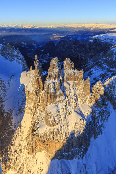 Aerial view of Catinaccio Group and Vajolet Towers at sunset. Sciliar Natural Park Dolomites Trentino Alto Adige Italy Europe