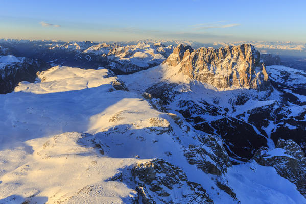 Aerial view of Sassolungo and Grohmann peak at sunset. Dolomites Sella Group Trentino Alto Adige Italy Europe