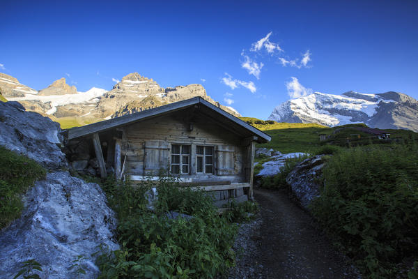 Wood cabin around Lake  Oeschinensee Bernese Oberland Kandersteg Canton of Bern Switzerland Europe