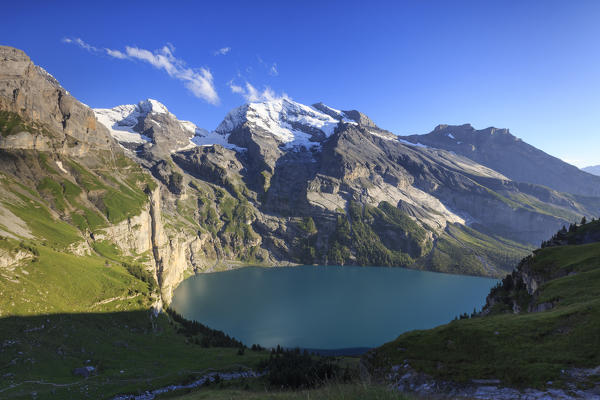 Summer view of Lake Oeschinensee Bernese Oberland Kandersteg Canton of Bern Switzerland Europe