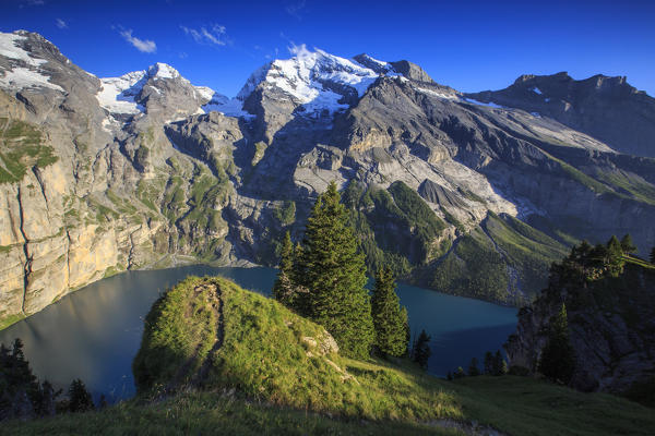 Summer view of Lake Oeschinensee Bernese Oberland Kandersteg Canton of Bern Switzerland Europe