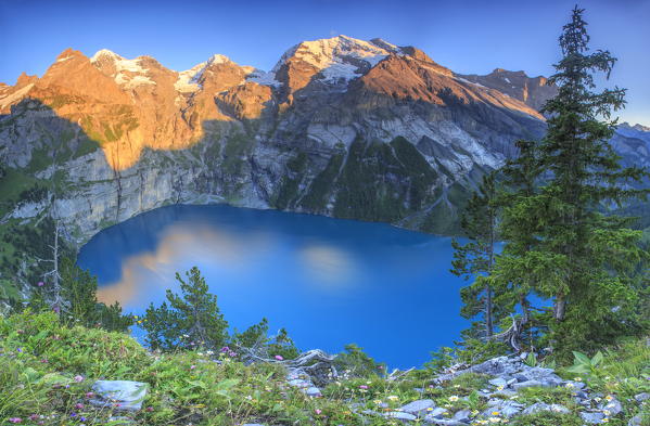 Sunset on Lake Oeschinensee Bernese Oberland Kandersteg Canton of Bern Switzerland Europe