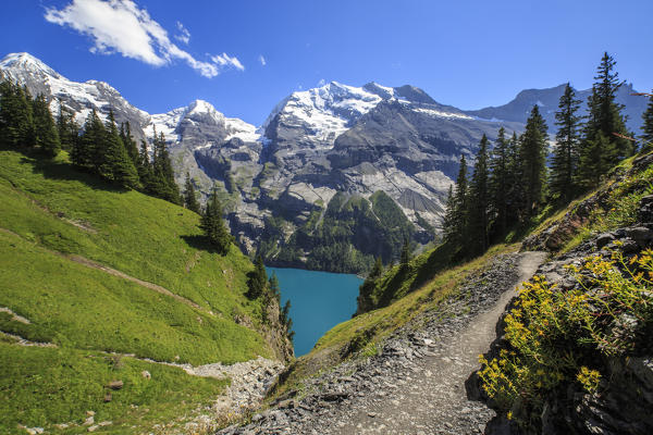 Summer view of Lake Oeschinensee Bernese Oberland Kandersteg Canton of Bern Switzerland Europe
