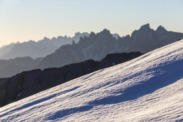 Dawn lights frames Cadini of Misurina Dolomites Auronzo of Cadore Veneto Italy Europe