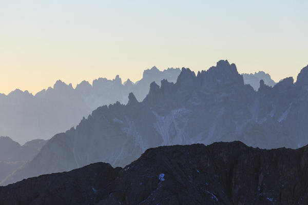 Dawn lights frames Cadini of Misurina Dolomites Auronzo of Cadore Veneto Italy Europe