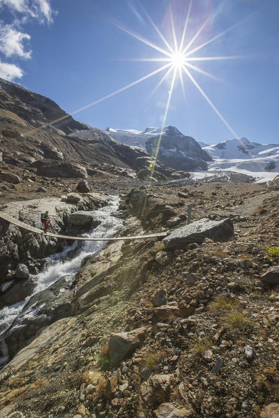 Tibetan bridge with Peaks Cadini and Pejo in background Cedec Valley Valfurva Valtellina Lombardy Italy Europe