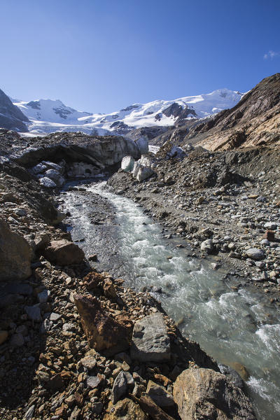 Mountain creek with Peaks San Matteo and Cadini in the background Forni Valley Valtellina Lombardy Italy Europe