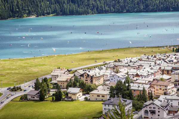 The turquoise water of Lake Silvaplana surrounded by green meadows Engadine Canton of Grisons Switzerland Europe