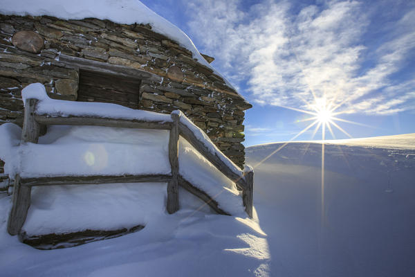 Snow covered hut after a heavy snowfall Motta di Olano Gerola Valley Valtellina Orobie Alps Lombardy Italy Europe
