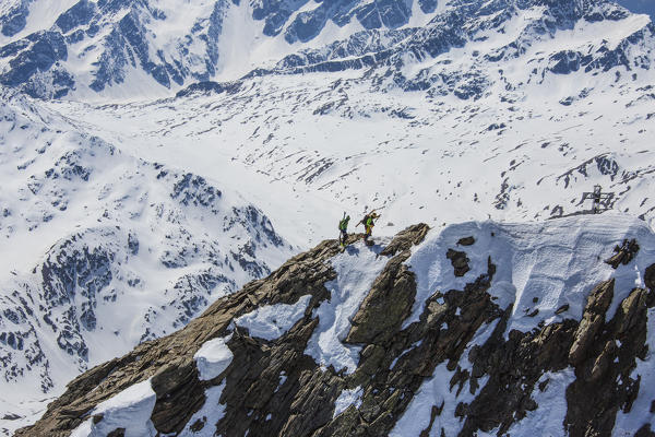 Aerial view of Forni Glacier and alpine skiers on Peak Dosegu Valtellina Valfurva Lombardy Italy Europe