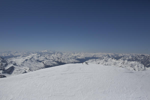 Aerial view of Forni Glacier and alpine skiers on Palon de la Mare Valtellina Lombardy Italy Europe