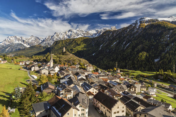 View of Ardez village surrounded by woods and snowy peaks Lower Engadine Canton of Graubünden Switzerland Europe