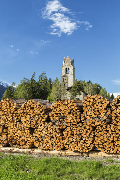 The church of San Gian surrounded by timber and snowy peaks Celerina Canton of  Graubünden Engadine Switzerland Europe