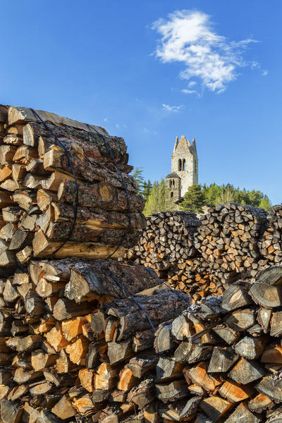 The church of San Gian surrounded by timber and woods Celerina Canton of  Graubünden Engadine Switzerland Europe