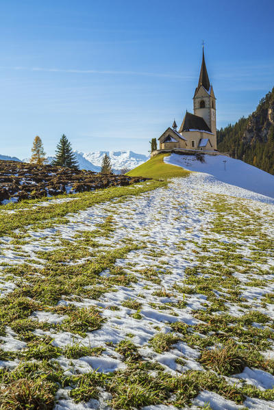 The church of the little village of Schmitten surrounded by snow Albula District Canton of Graubünden Switzerland Europe