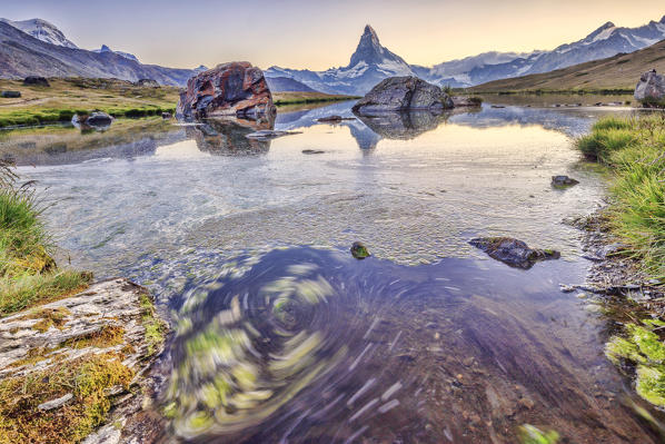 The Matterhorn reflected in Lake Stellisee at dawn Zermatt Pennine Alps Canton of Valais Switzerland Europe