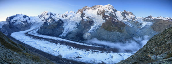 Panoramic view of Mount Rosa Massif and its glacier at dusk Zermatt Pennine Alps Canton of Valais Switzerland Europe