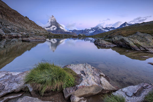 Matterhorn reflected in Lake Stellisee at dawn Zermatt Pennine Alps Canton of Valais Switzerland Europe