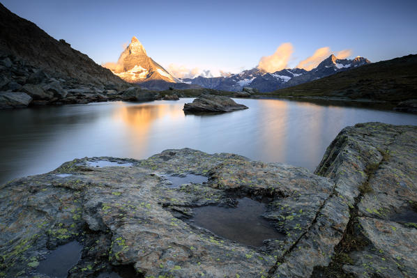 Matterhorn reflected in Lake Stellisee at dawn Zermatt Pennine Alps Canton of Valais Switzerland Europe