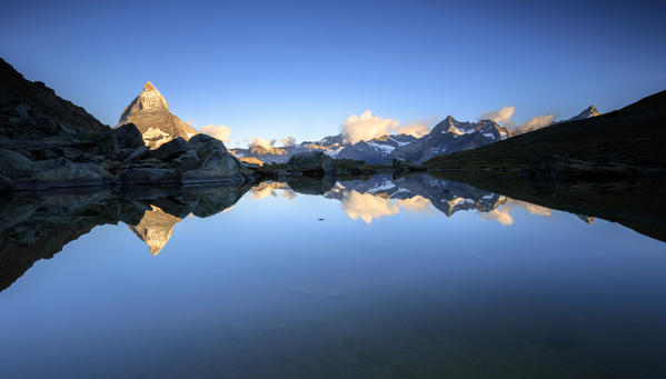 Matterhorn reflected in Lake Stellisee at dawn Zermatt Pennine Alps Canton of Valais Switzerland Europe