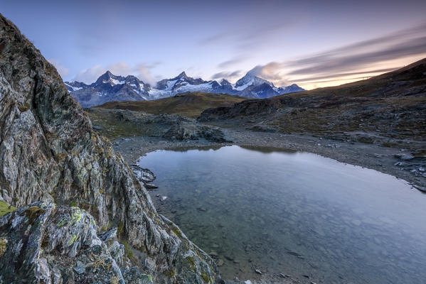 View of Weisshorn from Lake Stellisee at dawn Zermatt Pennine Alps Canton of Valais Switzerland Europe