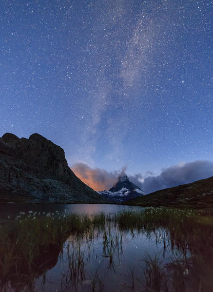 Stars and Milky Way above Lake Stellisee Zermatt Canton of Valais Switzerland Europe
