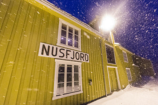 A blizzard hits the fishing village of Nusfjord at dusk Lofoten Islands Nordland County Norway Europe