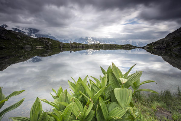 Clouds reflected in Lac de Cheserys  Chamonix Haute Savoie France Europe
