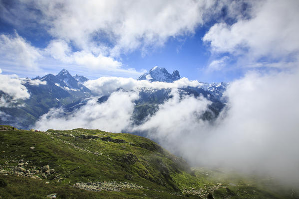 Low clouds and mist around Grandes Jorasses Chamonix Haute Savoie France Europe