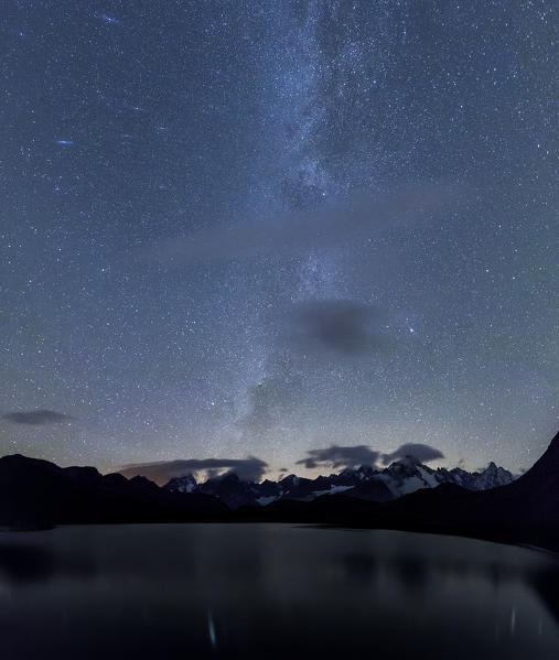 Starry summer sky on Fenetre Lakes and the high peaks Ferret Valley Saint Rhémy Grand St Bernard Aosta Valley Italy Europe