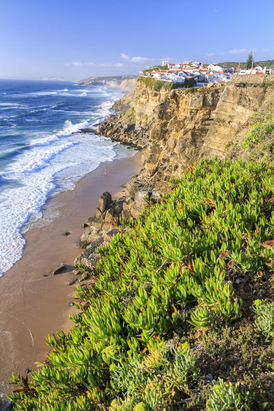 Top view of ocean waves crashing on the high cliffs of Azenhas do Mar Sintra Portugal Europe