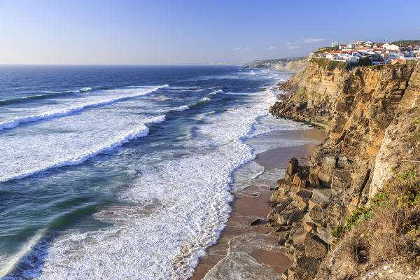 Top view of ocean waves crashing on the high cliffs of Azenhas do Mar Sintra Portugal Europe