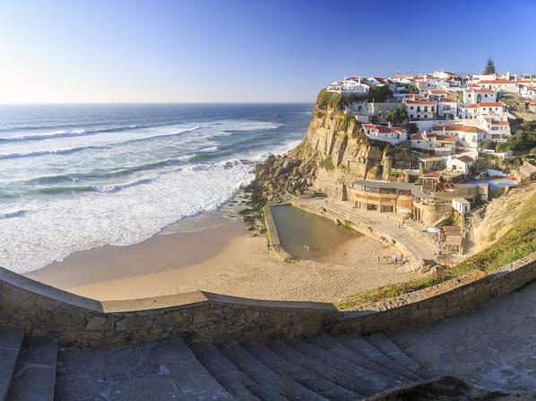 Panoramic view of ocean waves crashing on the high cliffs of Azenhas do Mar Sintra Portugal Europe