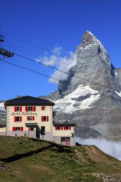 The hotel and the railway frame the Matterhorn in the background on a sunny summer day Gornergrat Valais Switzerland Europe