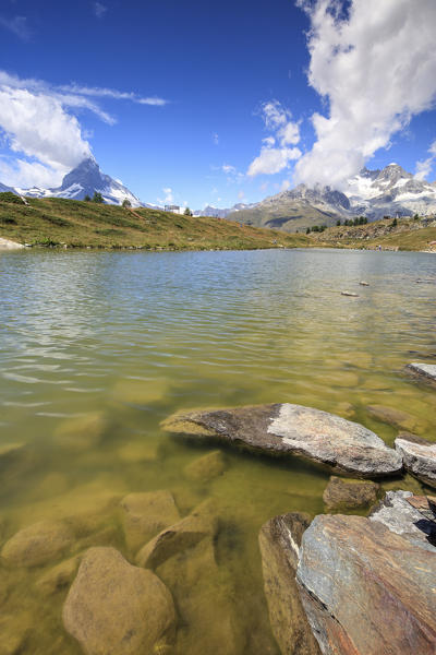 Lake Leisee frames the Matterhorn and the high peaks in the background in summer Zermatt Canton of Valais Switzerland Europe