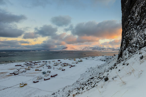 Top view of the fishing village surrounded by snow and the cold sea Eggum Vestvagøy Island Lofoten Islands Norway Europe