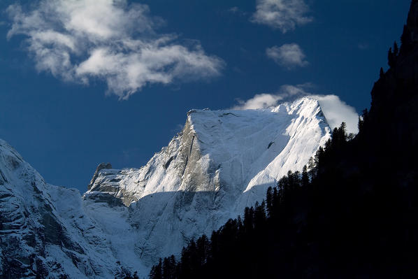 The north side of Badile snowy peak. Bregaglia Valley, Canton of Graubuenden, Switzerland Europe