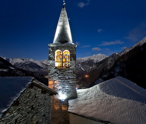 The bell tower of Savogno at night. Lombardy. Italy