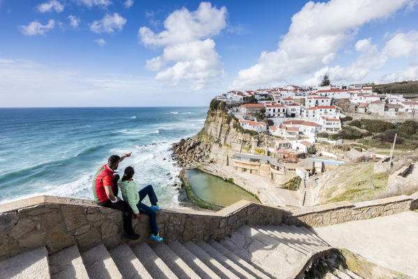 Tourists admire the perched village of Azenhas do Mar Overlooking the Atlantic ocean Sintra Portugal Europe