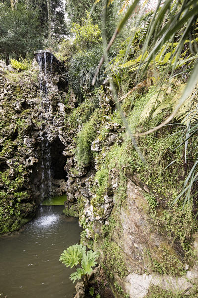 Waterfall Lake and caves inside the park of of Quinta da Regaleira a Unesco world Heritage Site Sintra Portugal Europe