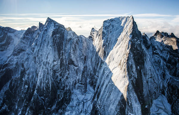 Aerial shot of the peaks Badile and Cengalo located between Masino and Bregaglia Valley border Italy Switzerland Europe