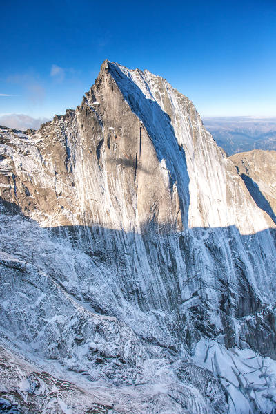 Aerial shot of the north face of Piz Badile located between Masino and Bregaglia Valley border Italy Switzerland Europe