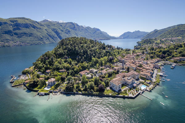 Aerial view of the turquoise waters of Lake Como and green headland that frames the village of Bellagio Italy Europe