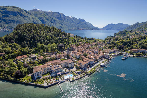 Aerial view of the turquoise waters of Lake Como and green headland that frames the village of Bellagio Italy Europe