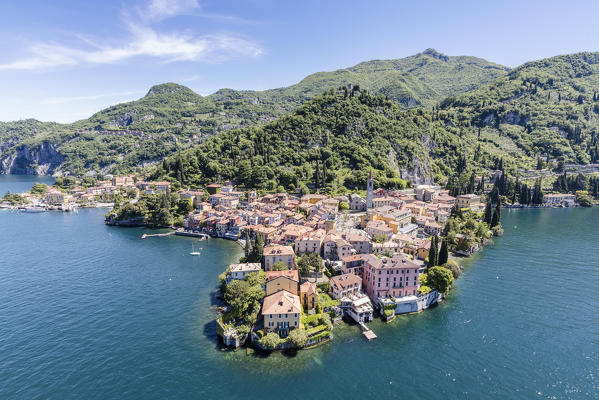 Aerial view of Varenna frames by the blue water of Lake Como on a sunny spring day Lecco Province Lombardy Italy Europe