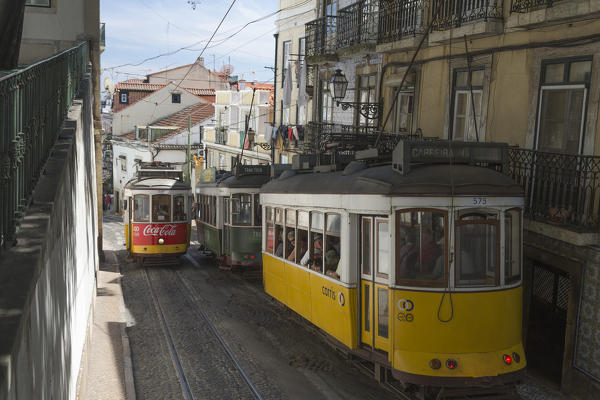 The characteristic tram proceed towards Bairro Alto a central district of the old city of Lisbon Portugal Europe