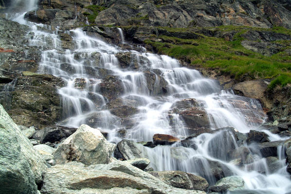 A waterfall in the Roseg Valley, Val Roseg, Engadine Switzerland Europe